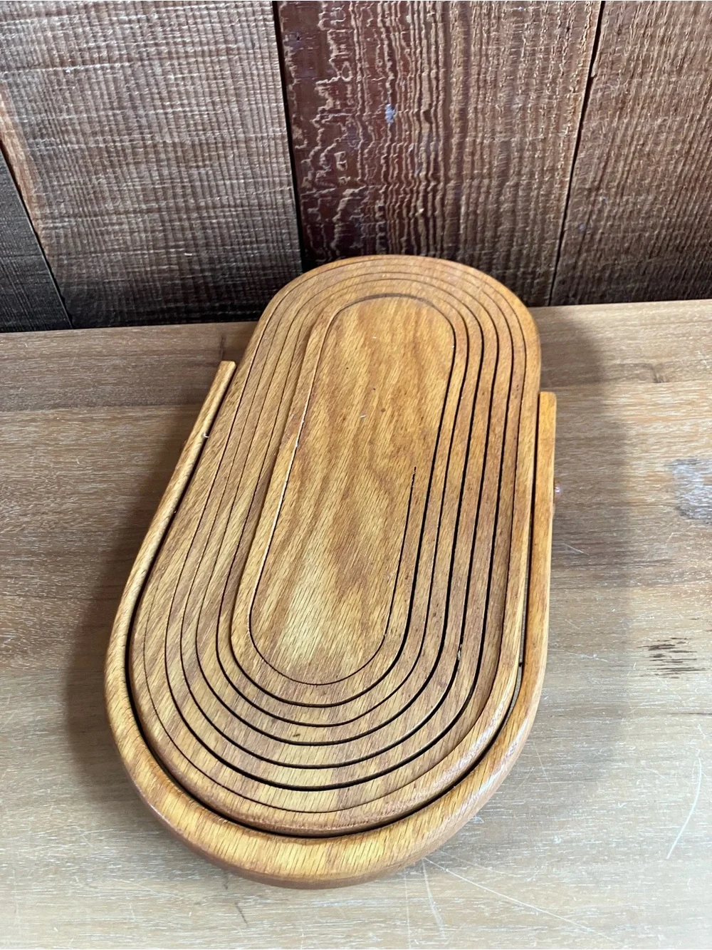 Wooden collapsible basket with locking handle